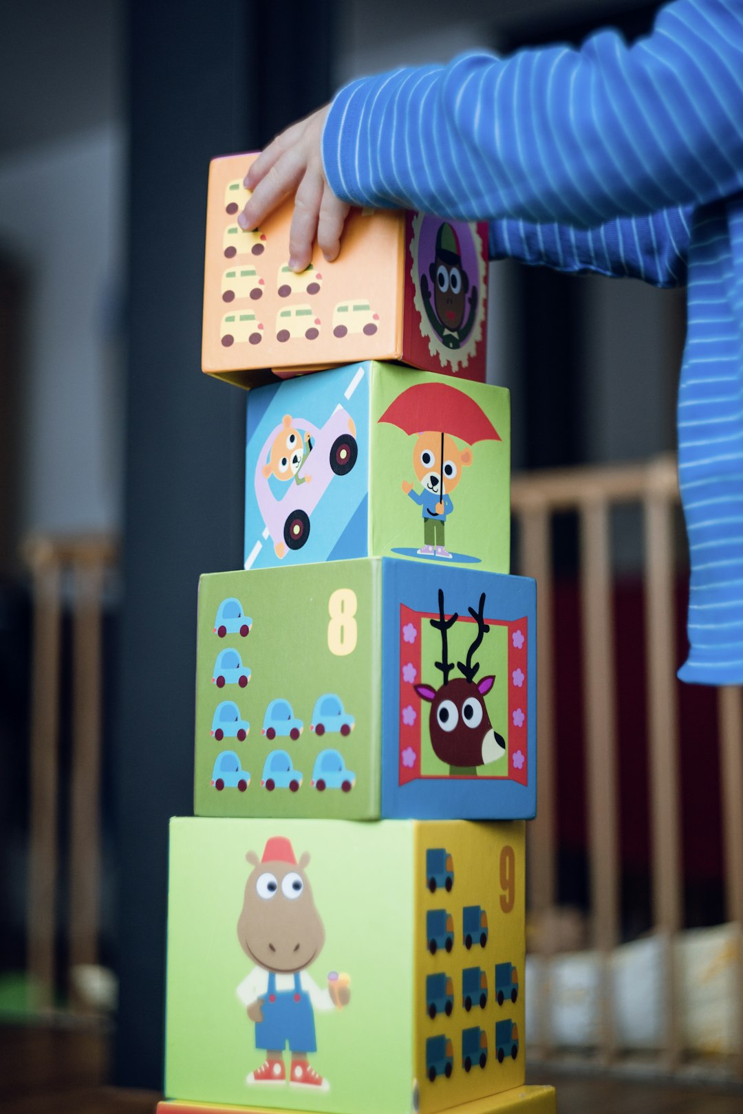 Learning Center A child stacking colorful blocks