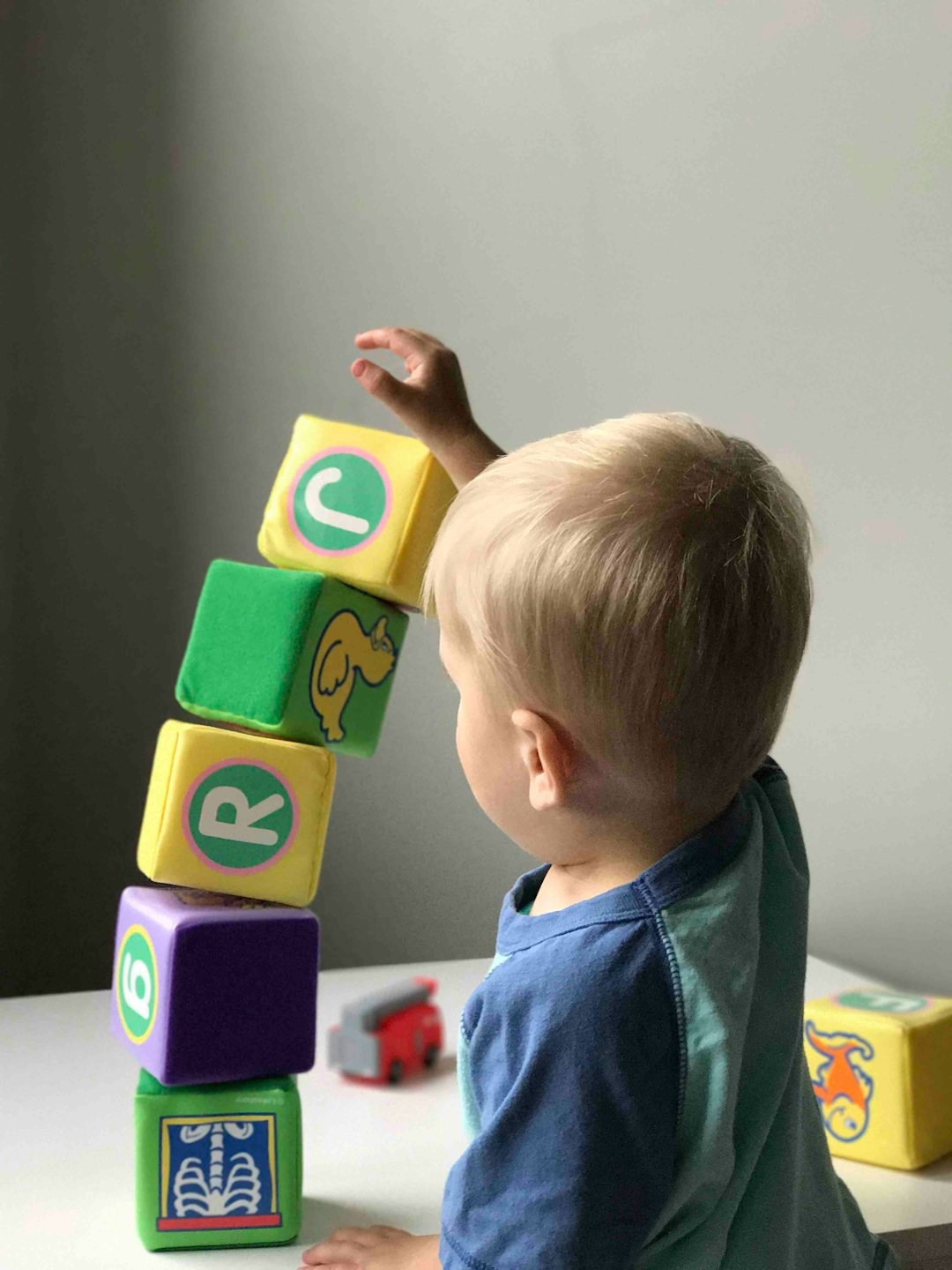 Learning Center A child playing with blocks