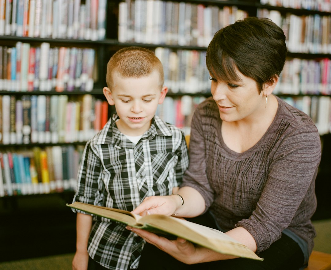 Learning Center A parent reading a book with a young child