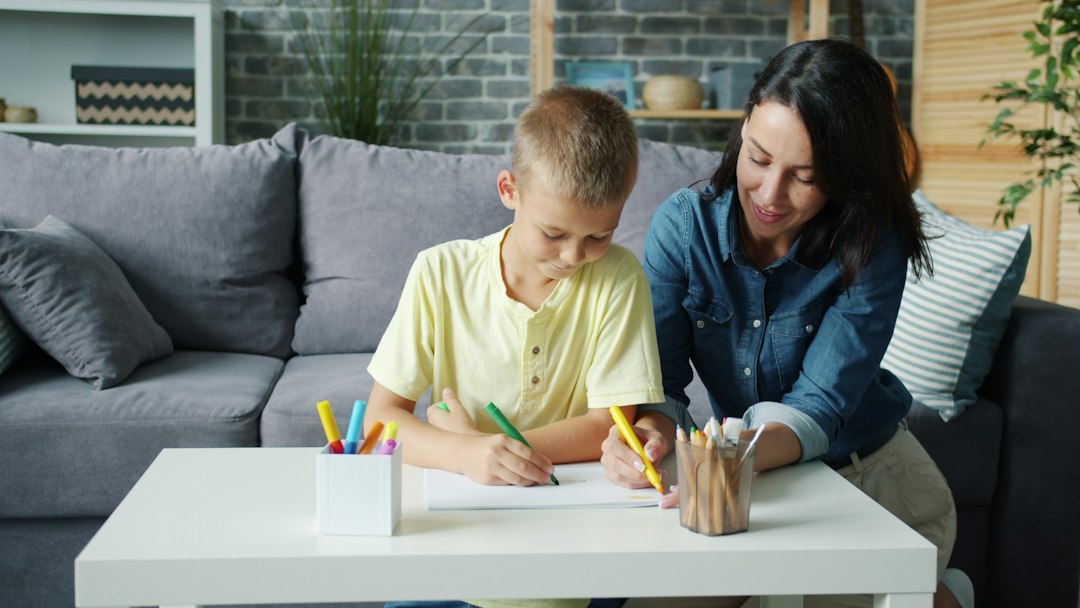 A caregiver and child working together, representing supported therapy progress